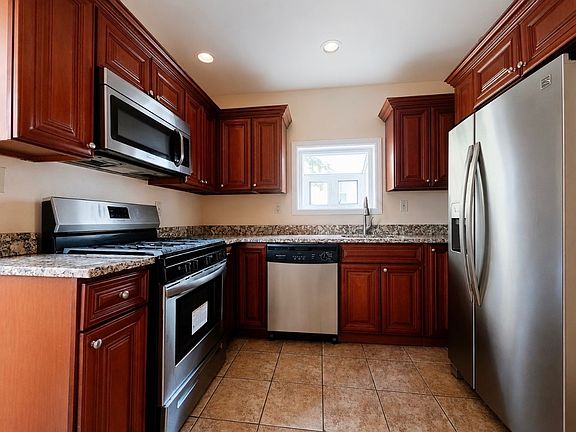 Updated Kitchen with stainless steal appliances.