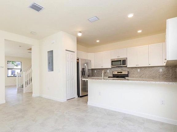 5th image of 10575 W 33rd Way Unit 10575