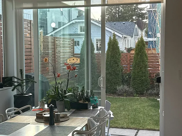 Dining Area looks out into private garden.