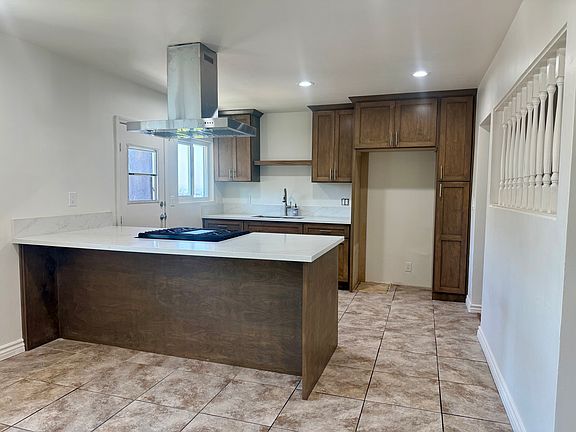 Newly renovated kitchen. Island for extra seating.