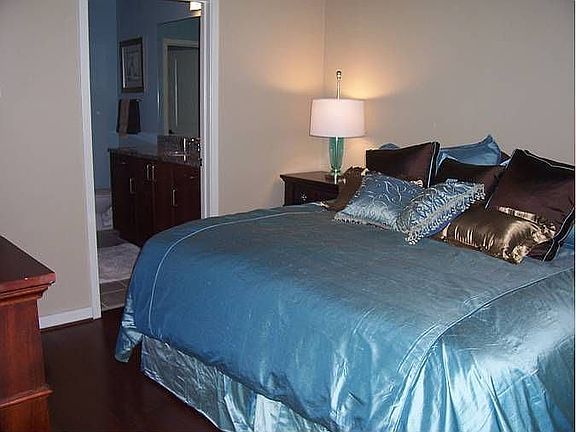 large bedroon with downtown views