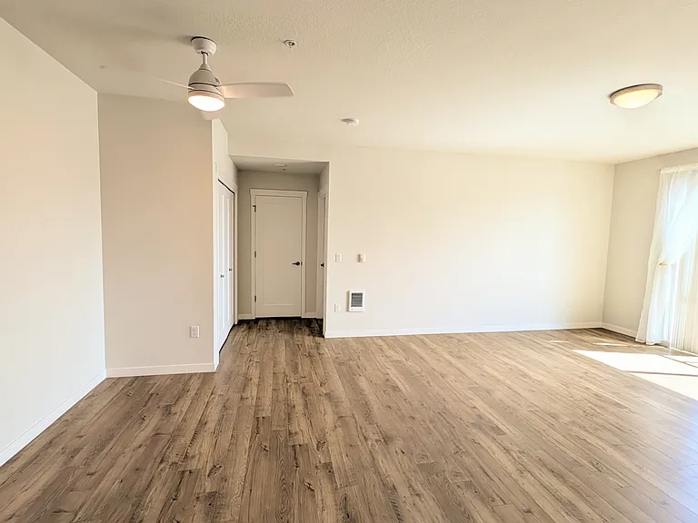View from the kitchen looking toward the living and dining areas.