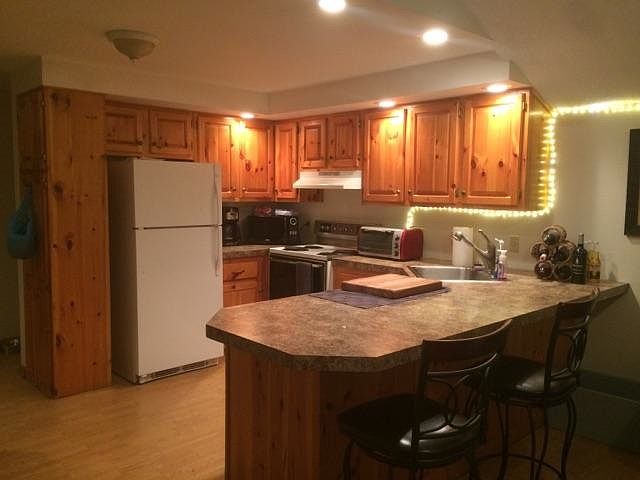 Knotty pine kitchen with island