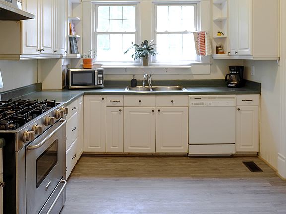 Full kitchen including five burner gas stove and dishwasher