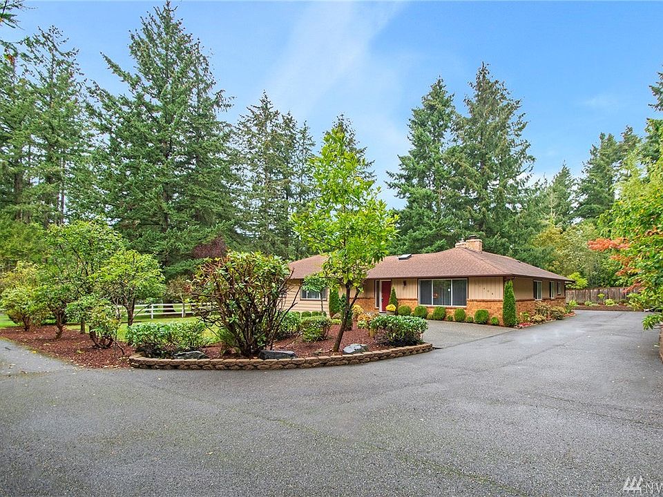 Classic, & timeless home surrounded by the beauty of mother nature.