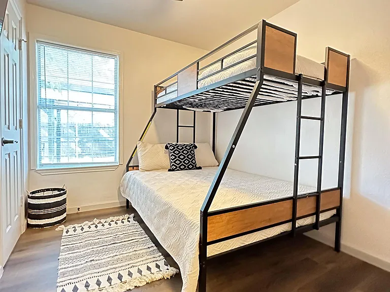 Full Bunk bed below and Twin Bed Above