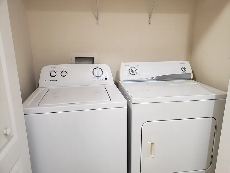 UPSTAIRS LAUNDRY WITH WASHER AND DRYER