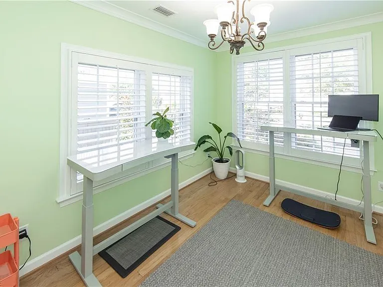 East facing, beautifully sunny office with standing desks for two people.