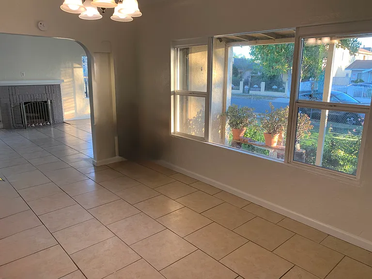 Ample sized dining room with beautiful windows offering natural light.
