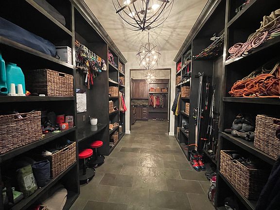 Gear room located off of garage and mud room