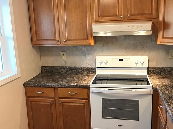 Kitchen range with vented exhaust fan.