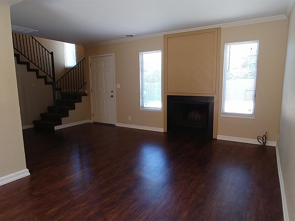 Living Room with Woodburning Fireplace