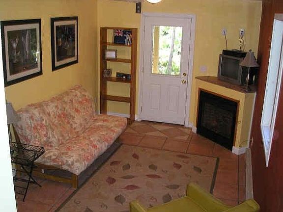 Game / TV room with propane fireplace