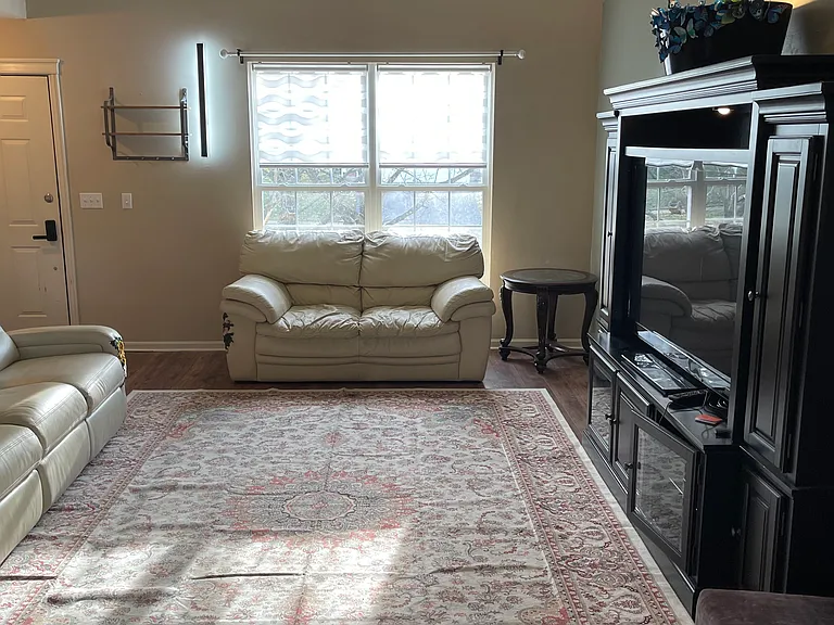 leather recliners, and hardwood furniture , 65"TV