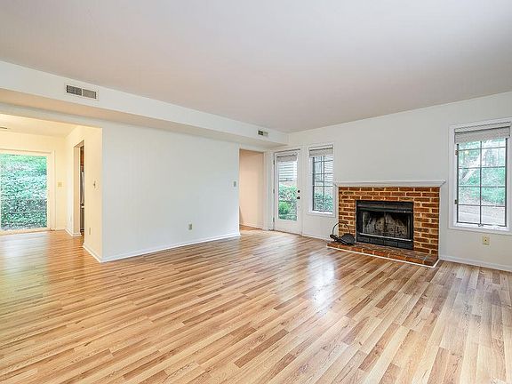 Living room with wood burning fireplace