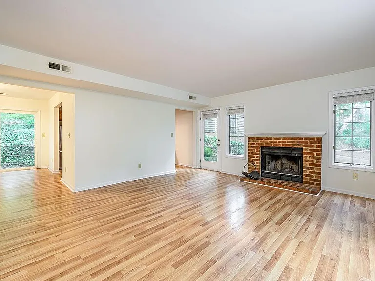 Living room with wood burning fireplace