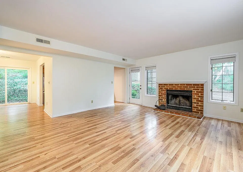 Living room with wood burning fireplace