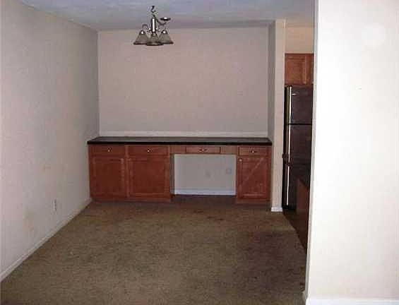 dining area / office at the wall