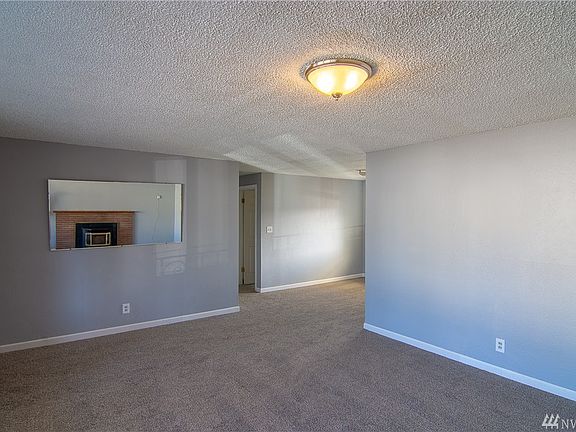 Looking from the fireplace towards the dining area