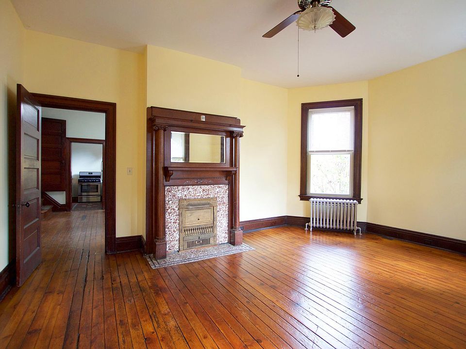 Living room looking into dining room to kitchen