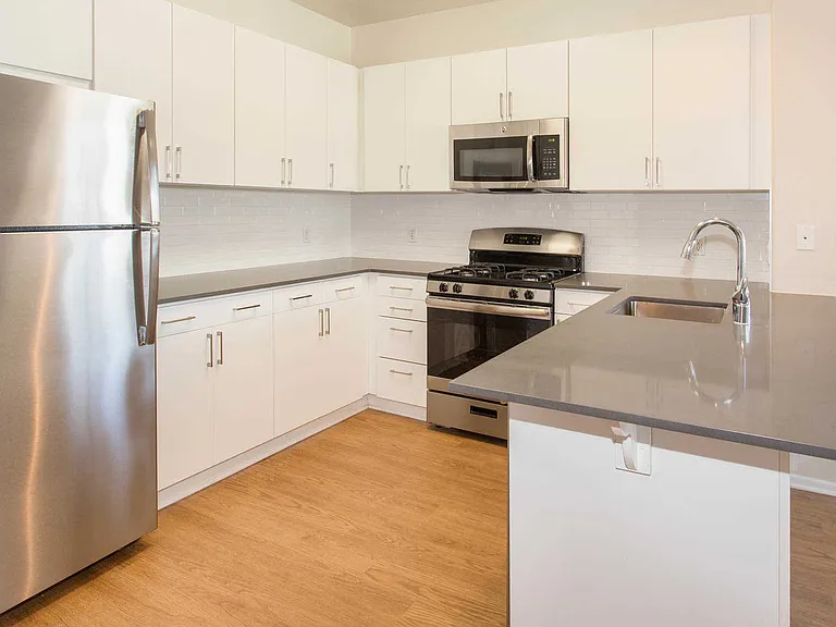 Phase 2 Kitchen with Stainless Steel Appliances and Granite Countertops