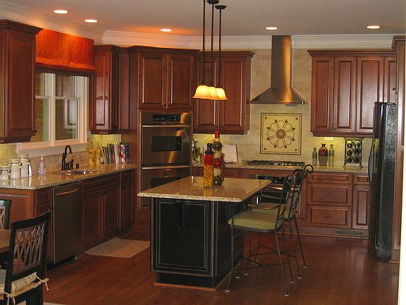 Chef's kitchen features granite, SS appliances, & 3 convection ovens!