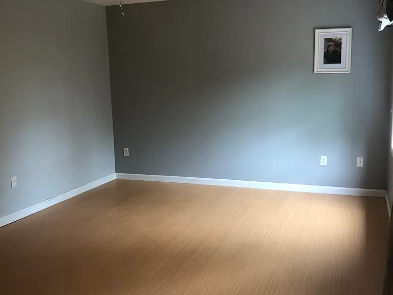 main bedroom with update floors