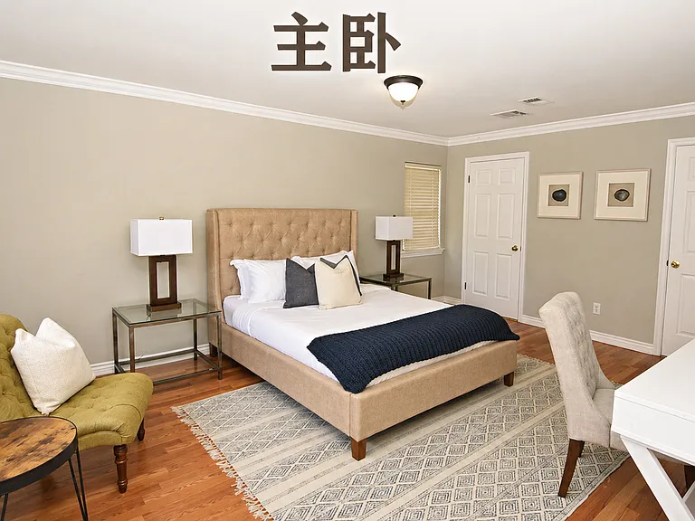 Generous primary bedroom suite offering neutral plush carpeting, deep closet storage, and ample natural light.