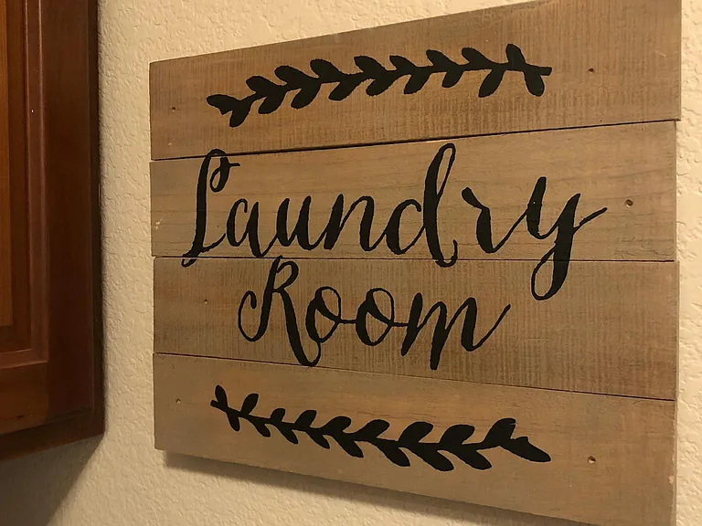 Laundry room with washer and dryer hookups. Machines need to be provided by tenant, but can be negotiated into the lease price if purchased by landlord.