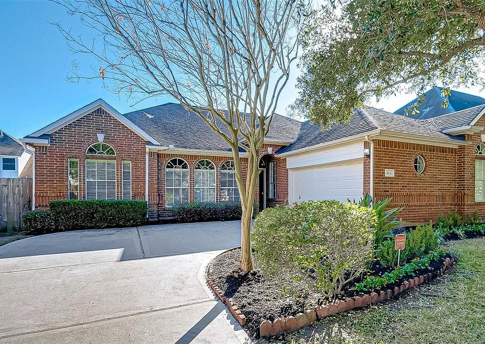 Beautiful brick exterior with landscaped front yard.