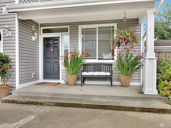 Nice entry porch where you can sit and watch little ones play and ride their bikes or you can just sit and relax!