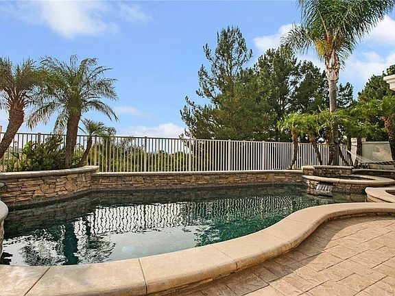 Year round swimming in this beautiful property! Pool and spa with jets and waterfall