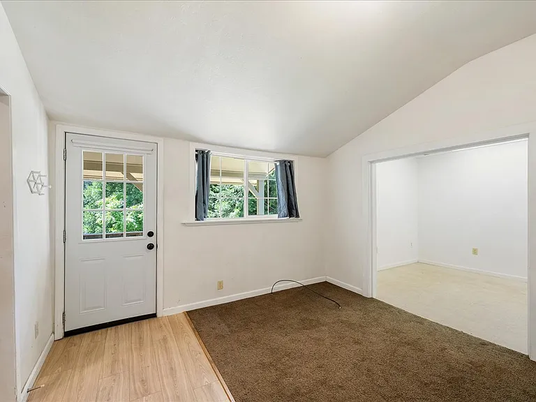 Office and playroom with access to backyard