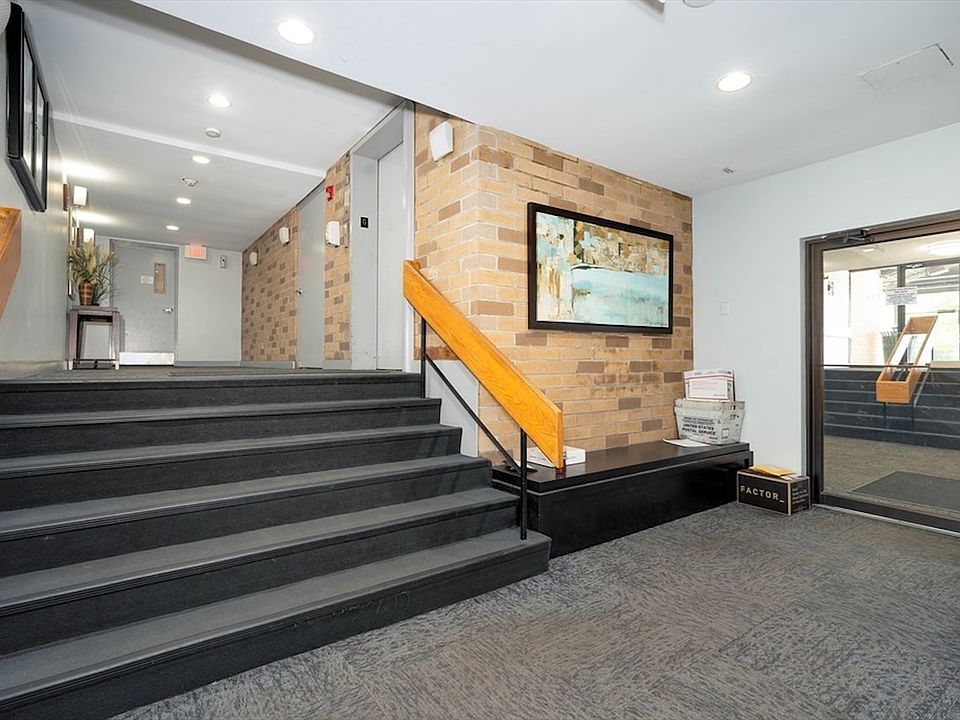 Short flight of stairs leading to the elevator.