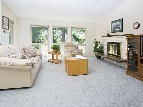 Living room with vaulted ceilings