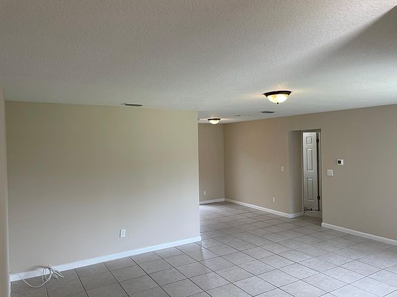 Living room - All walls and ceiling freshly painted.