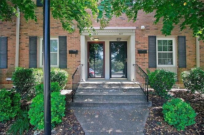 This cozy brick townhouse has everything you have been looki