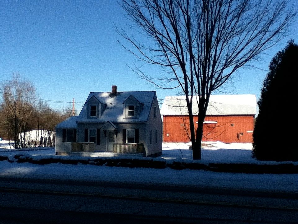 cozy house with the winter snow