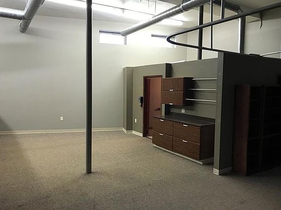 Living room (storage cabinets will be removed unless the residential tenant requests them to stay in the space)