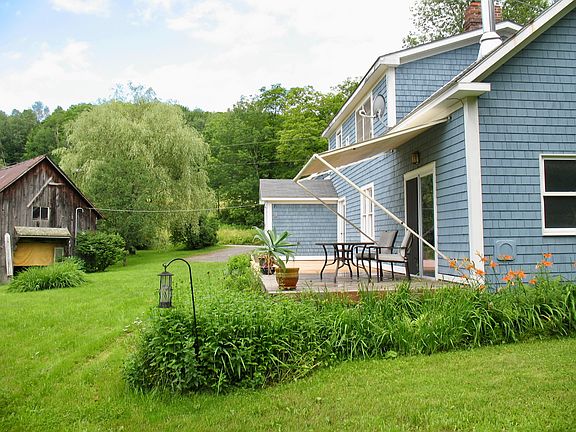 Far Side Lawn & House