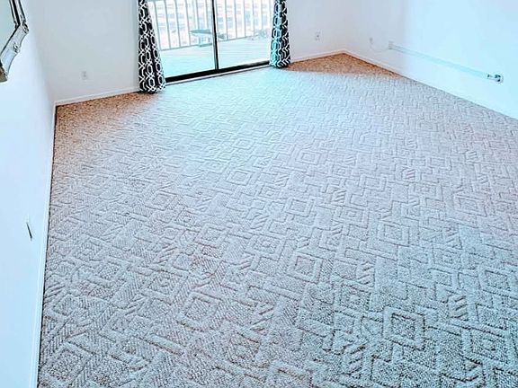 Living room and view, from kitchen.