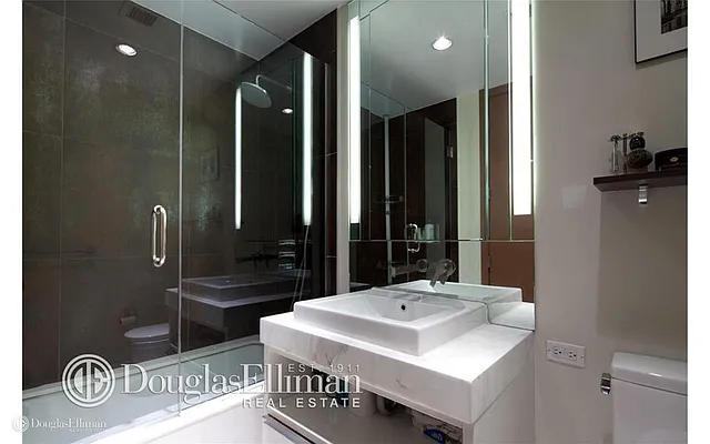 Sold by Douglas Elliman | media 18