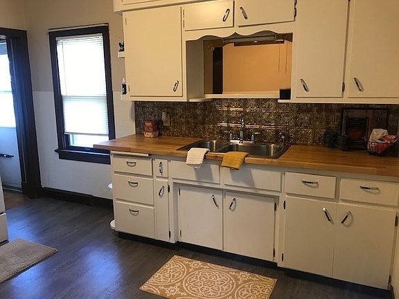 bright kitchen with new flooring and countertop