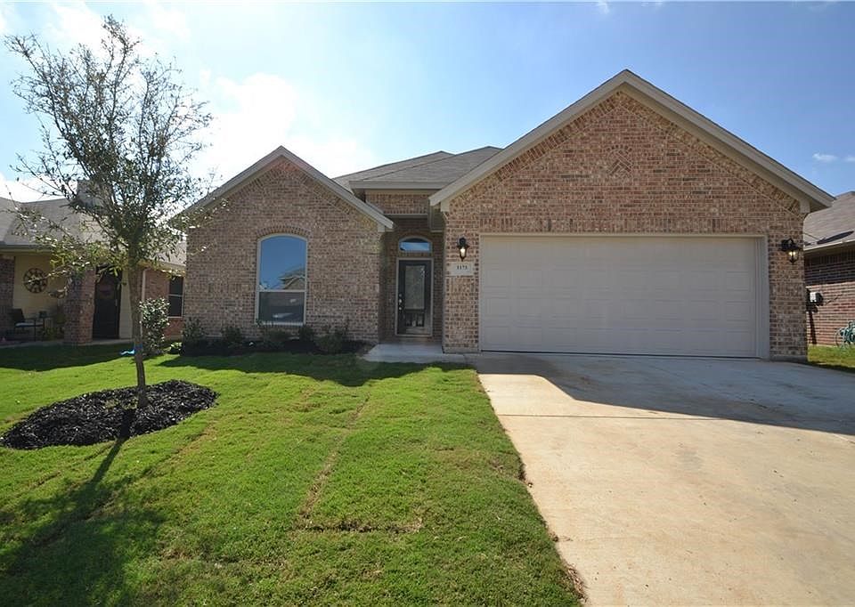 1173 Roping Reins Drive!  Beautiful elevation with acme brick, buff mortar!