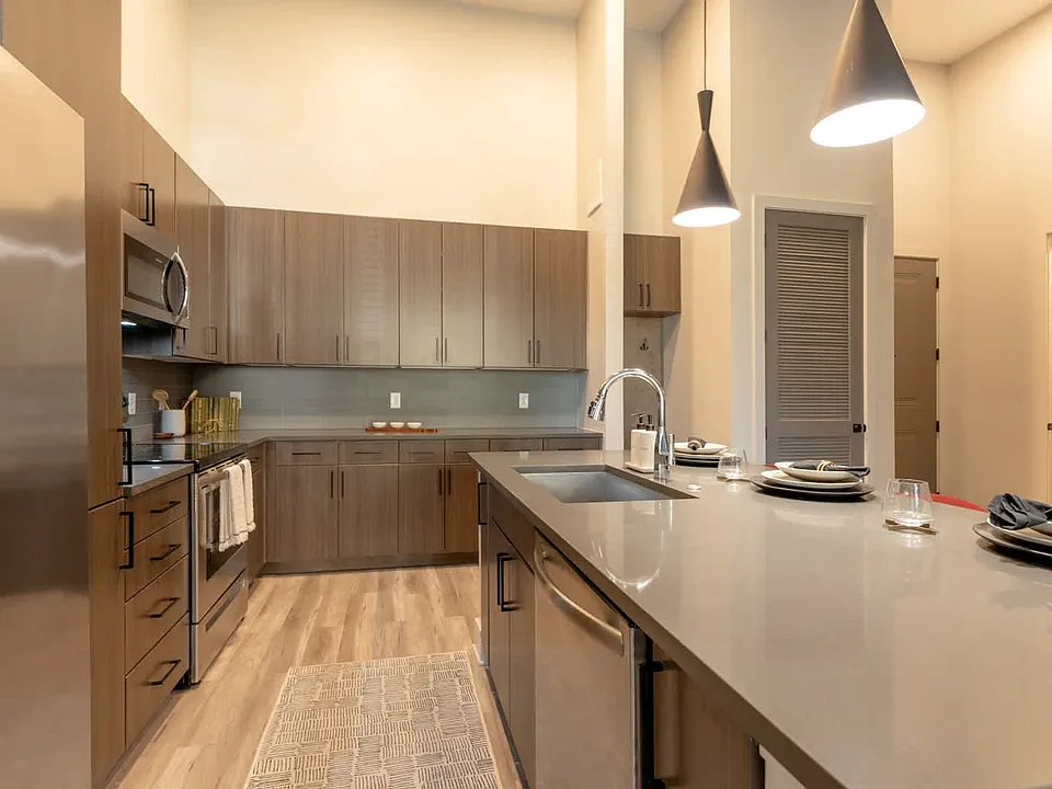 Kitchen with Stainless Steel Appliances and Quartz Countertops