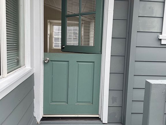 Dutch door entry offers character and air flow through the property.