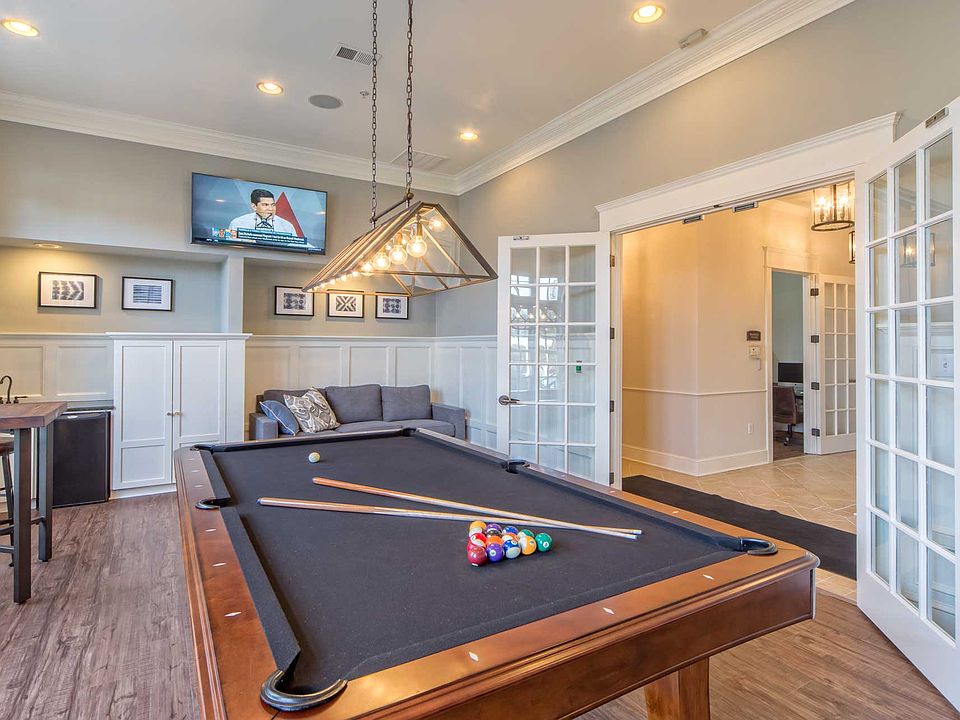 Play a round of billiards in the clubhouse parlor