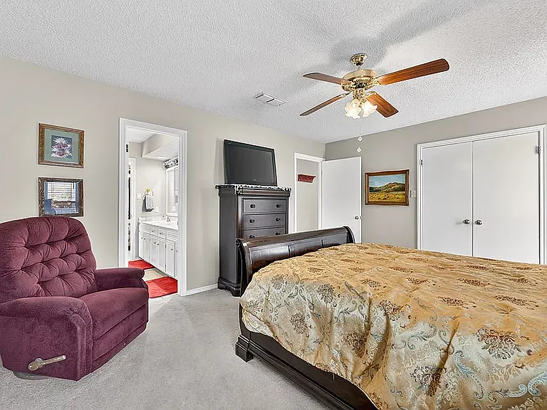 3rd bedroom. Large room (this photo shows a queen bed, dresser, recliner chair and has 2 nightstands - furniture not included - just showing size)