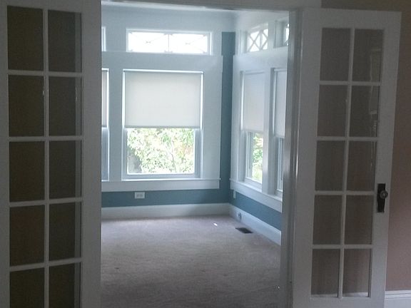 lovely French doors separating living room and sun room