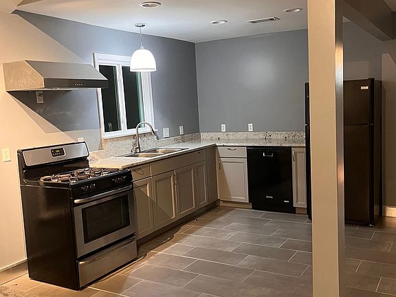 Full Kitchen *upper shelves coming soon* open to living space